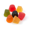 Lion Midget Gems firm chewy fruit gums with classic liquorice black gem