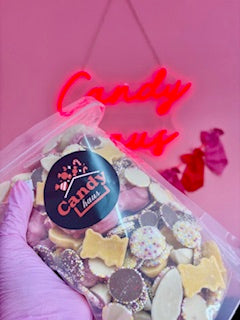 Chocolate flavoured pick and mix pouch filled with assorted chocolate sweets