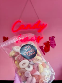 Fizzy mix pouch filled with assorted sour and sugar‑coated gummy sweets